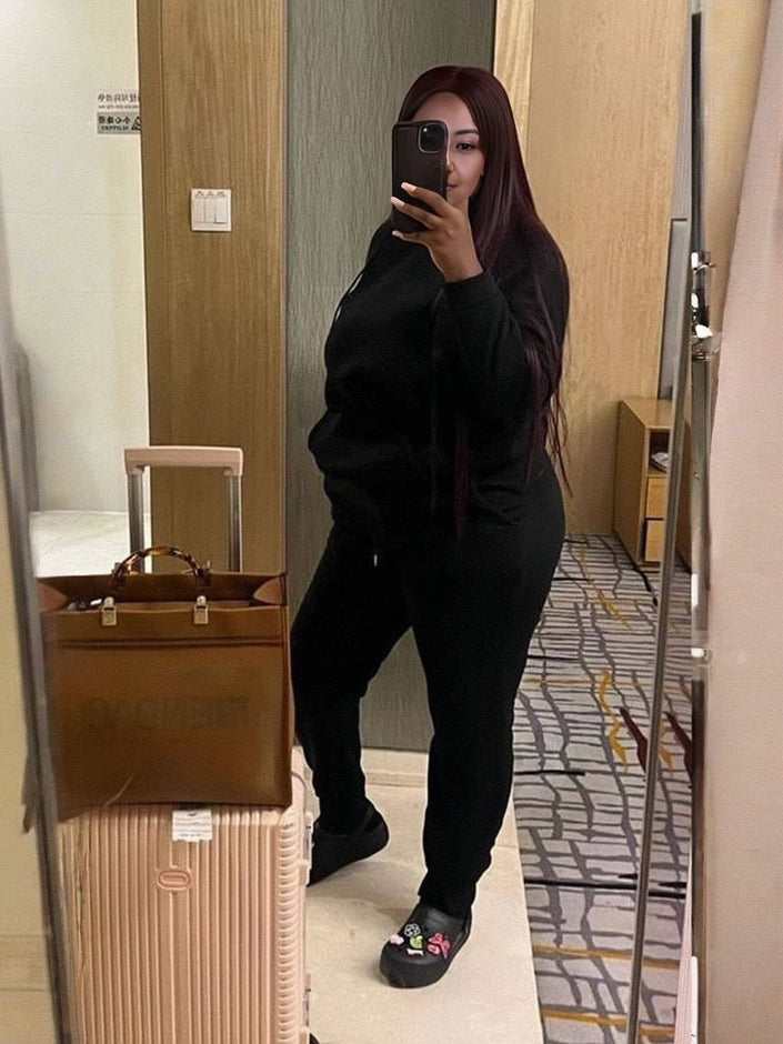 Black hoodie and jogger sweatpants set with front pocket and drawstring waist