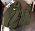 Olive-green hoodie and matching sweatpants set with drawstring hood and pockets