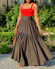 Sleeveless red tank top and patterned maxi skirt twin set with wide waistband
