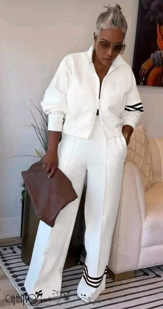 White zip-front jacket and wide-leg striped pants set