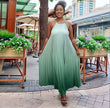 Pleated maxi dress, green sleeveless with thin straps and gathered flowing skirt