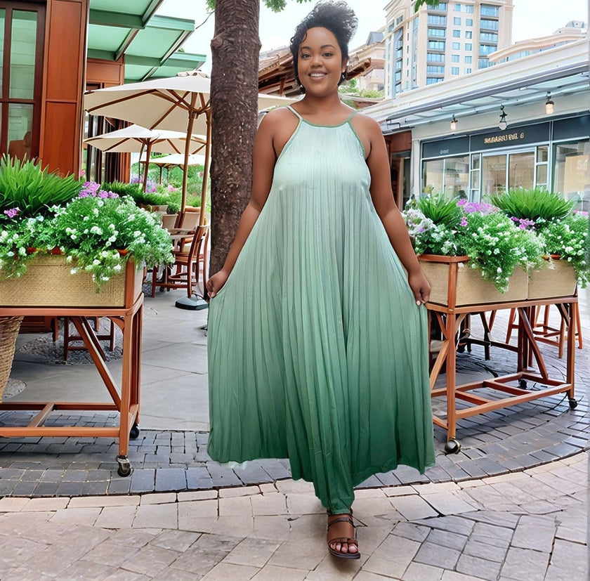 Pleated maxi dress, green sleeveless with thin straps and gathered flowing skirt