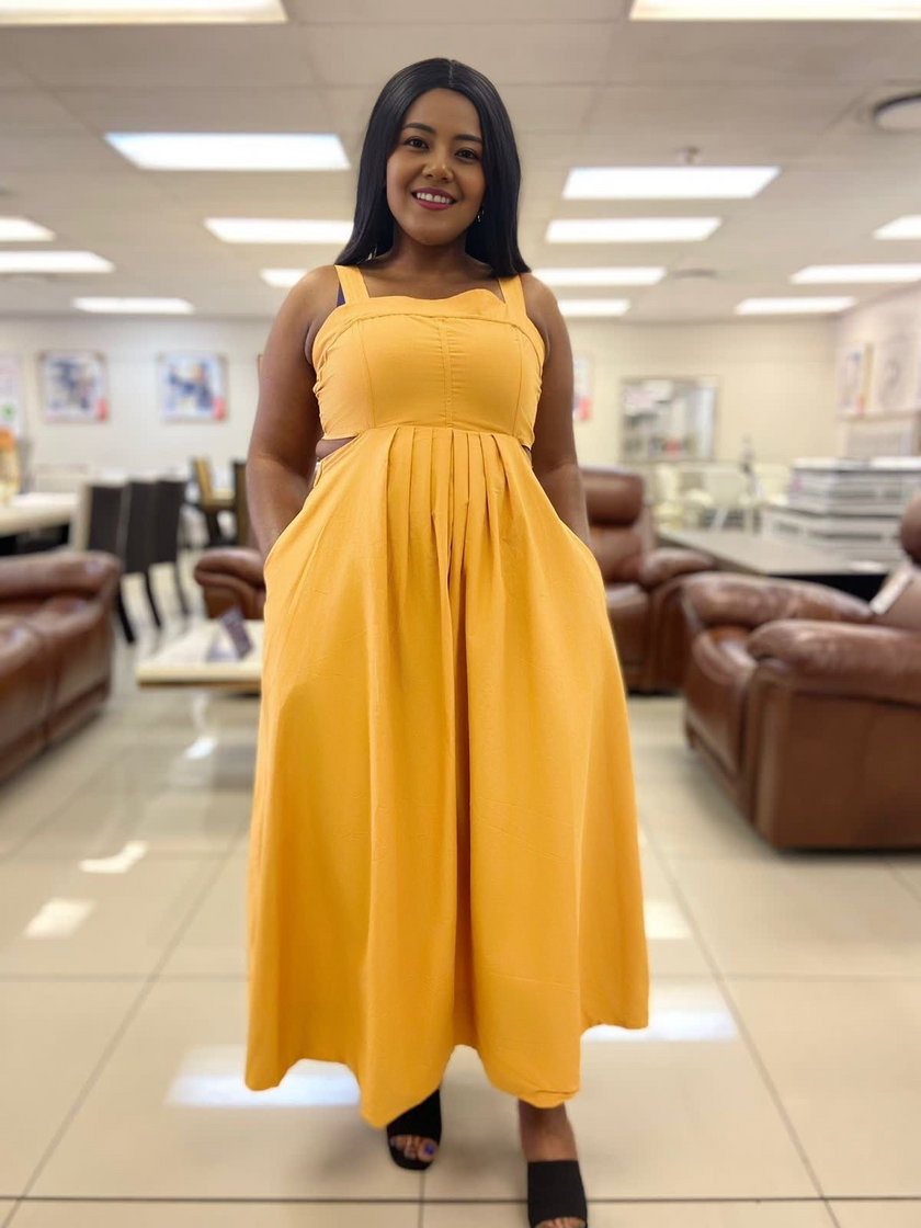 Yellow pleated sleeveless midi dress with square neckline and cinched high waist