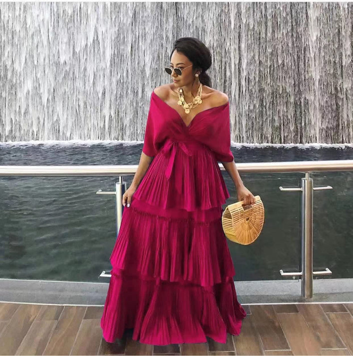 Fuchsia off-shoulder tiered maxi dress with draped V neckline and ruffle skirt