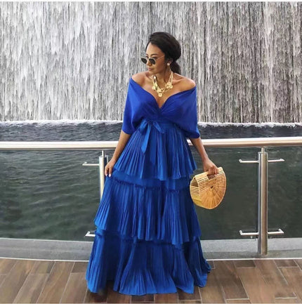 Royal blue off-shoulder tiered maxi dress with draped V neckline and ruffle skirt