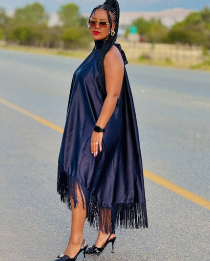 Asymmetrical fringe evening dress, sleeveless dark blue with tassel hem detail