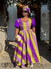 Purple maxi dress with puff sleeves and geometric stripe print, fitted bodice