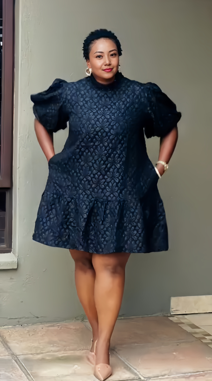 Lace mini dress with puff sleeves, dark lace floral pattern, fitted bodice, flared hem