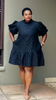 Lace mini dress with puff sleeves, dark lace floral pattern, fitted bodice, flared hem