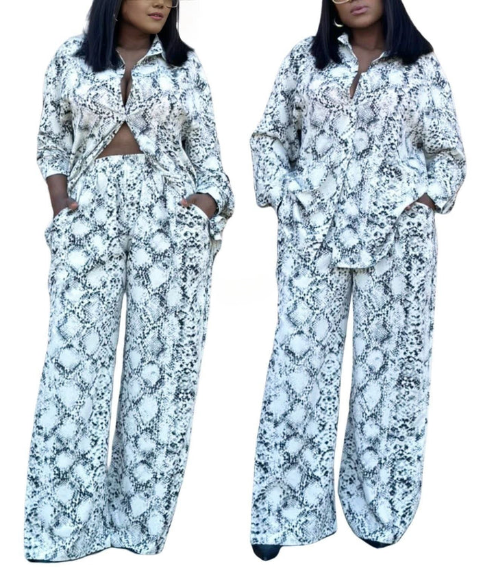 Snake print twin set: knotted button blouse and wide-leg pants, light blue/dark pattern
