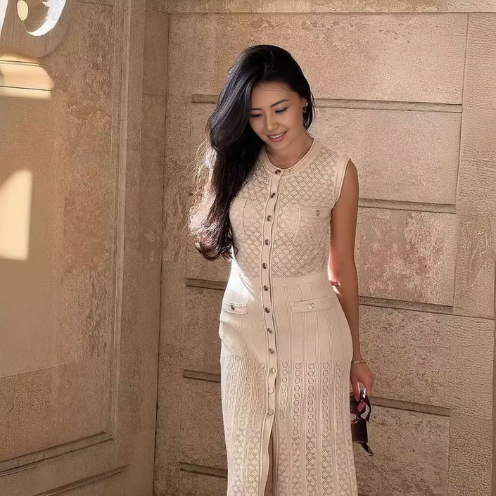 Cream sleeveless knit maxi dress with front buttons, textured knit and patch pockets