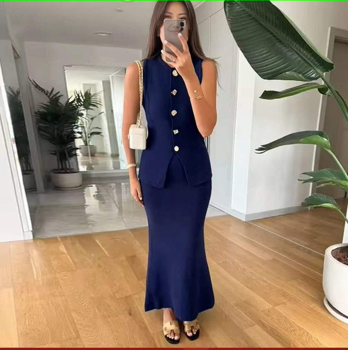 Navy-blue sleeveless knit cardigan set with buttons and matching long skirt