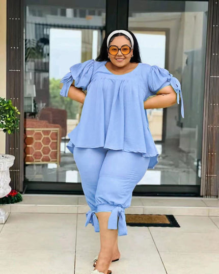 Sky-blue ruffle-sleeve twin set with peplum top and pull-on stretch waist pants