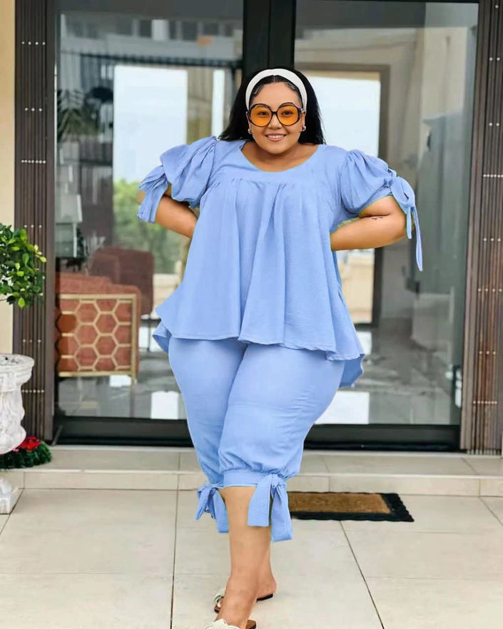 Sky-blue ruffle-sleeve twin set with peplum top and pull-on stretch waist pants