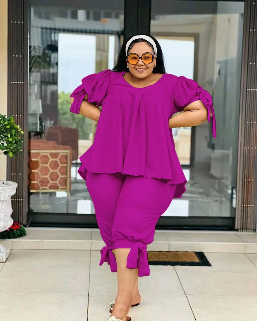 Purple ruffle-sleeve twin set with peplum top and pull-on stretch waist pants
