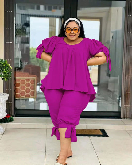 Purple ruffle-sleeve twin set with peplum top and pull-on stretch waist pants