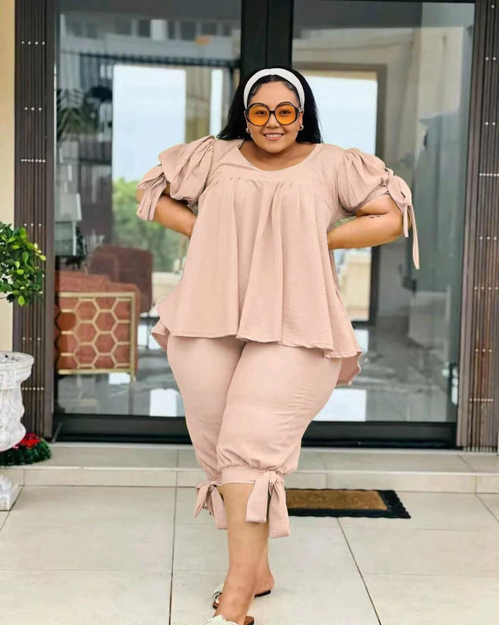Peach ruffle-sleeve twin set with peplum top and pull-on stretch waist pants