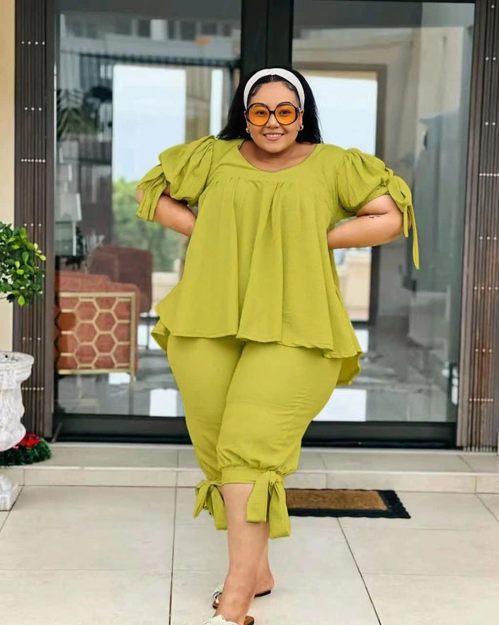 Green ruffle-sleeve twin set with peplum top and pull-on stretch waist pants
