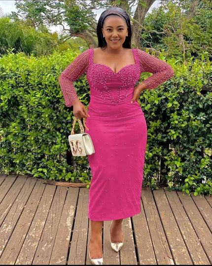 Hot-pink sequin sheath midi dress with sweetheart neckline and long sleeves