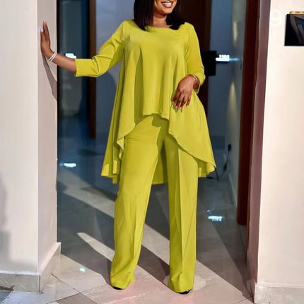 Bright lime-green asymmetrical blouse and wide-leg pants twin set