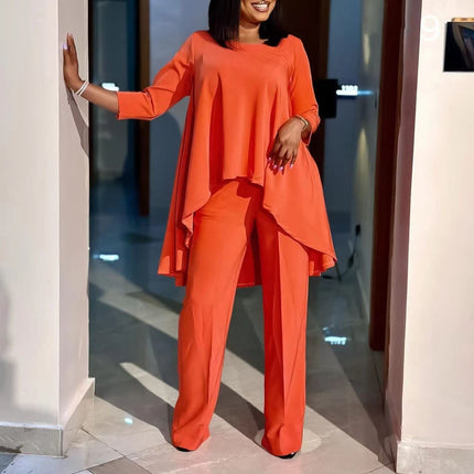 Orange-red asymmetrical blouse and wide-leg pants twin set