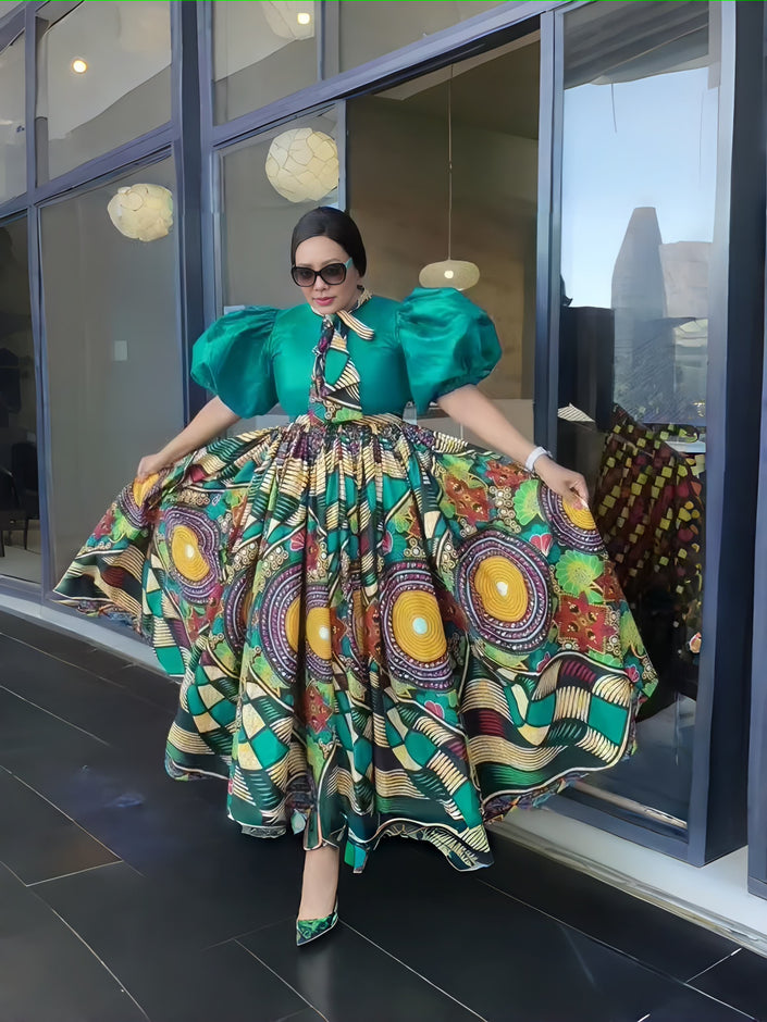 African print maxi dress with green puff sleeves and multicolor flared skirt