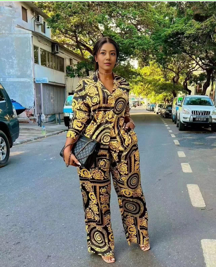Printed matching top and trouser set, black with gold and yellow baroque pattern