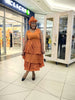 Orange sleeveless V-neck layered midi dress, tiered circular print