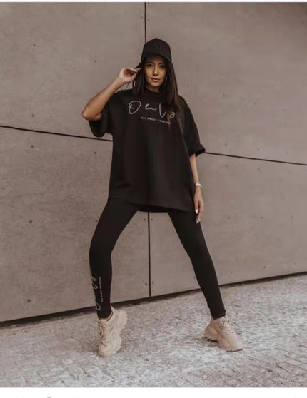 Printed short-sleeve top and leggings set, black with script logo on chest and legs