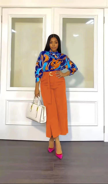 Printed blouse and straight trousers set: multicolor blouse with orange straight pants