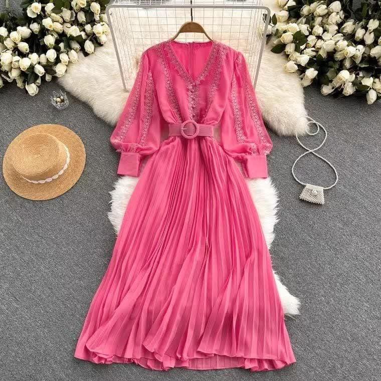 Pink pleated maxi dress with V-neck, long sleeves, and waist belt detail