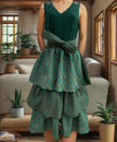 Green sleeveless V-neck layered midi dress with circular patterned tiered skirt
