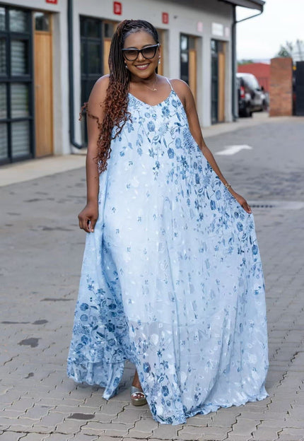 Floral maxi dress with spaghetti straps, light blue sleeveless tiered skirt