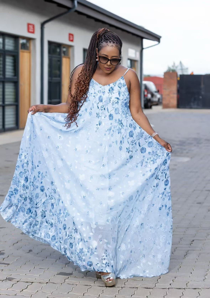: Women's Sleeveless Floral Maxi Dress with Spaghetti Straps and Flowing Design