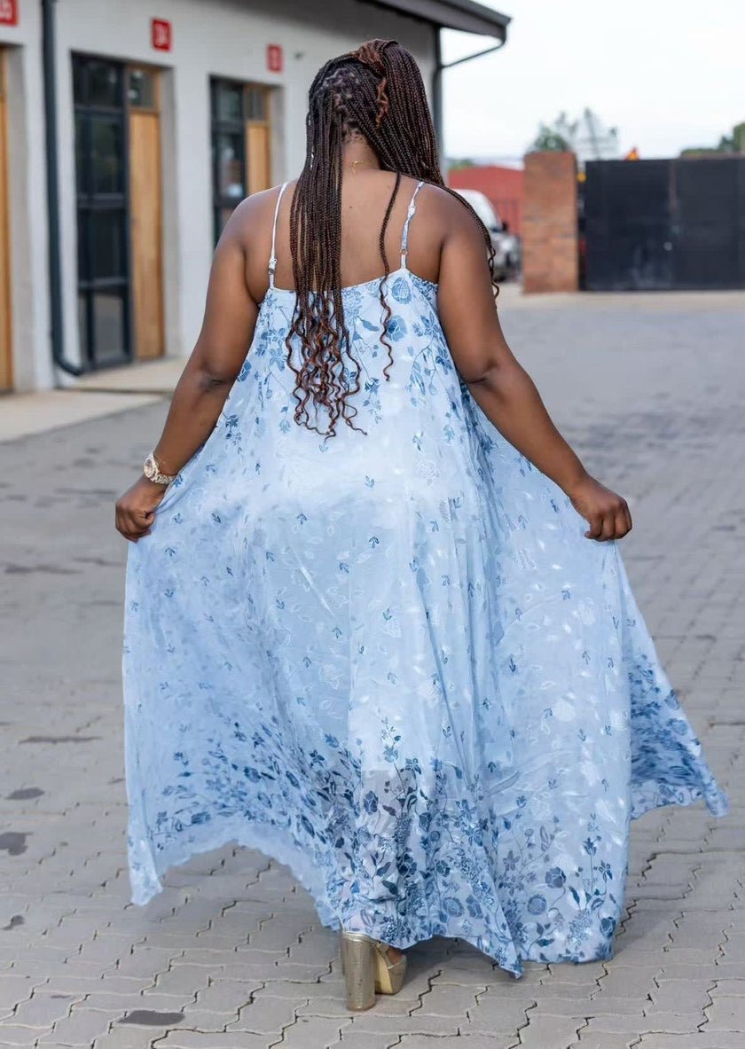 : Women's Sleeveless Floral Maxi Dress with Spaghetti Straps and Flowing Design