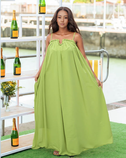 Flowy yellow-green maxi dress with adjustable spaghetti straps and gathered neckline
