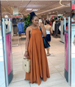 Burnt orange pleated spaghetti-strap maxi dress with scoop neckline, long skirt