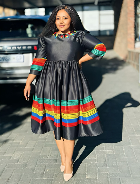 Mid-Length Flared Skirt Dress with Striped Hemline and Cuff Detailing