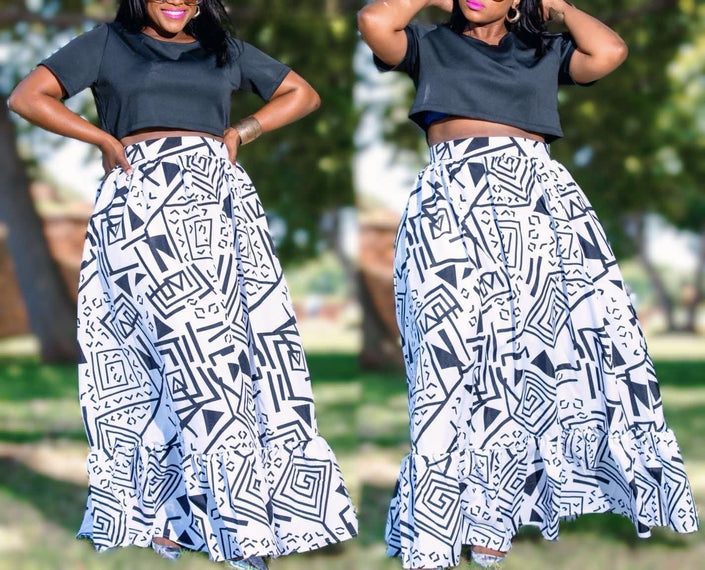 White and navy geometric print maxi skirt with gathered waist and full flare