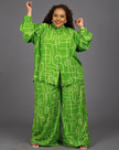 Geometric print shirt and pants set in bright green with puff sleeves and wide-leg pants