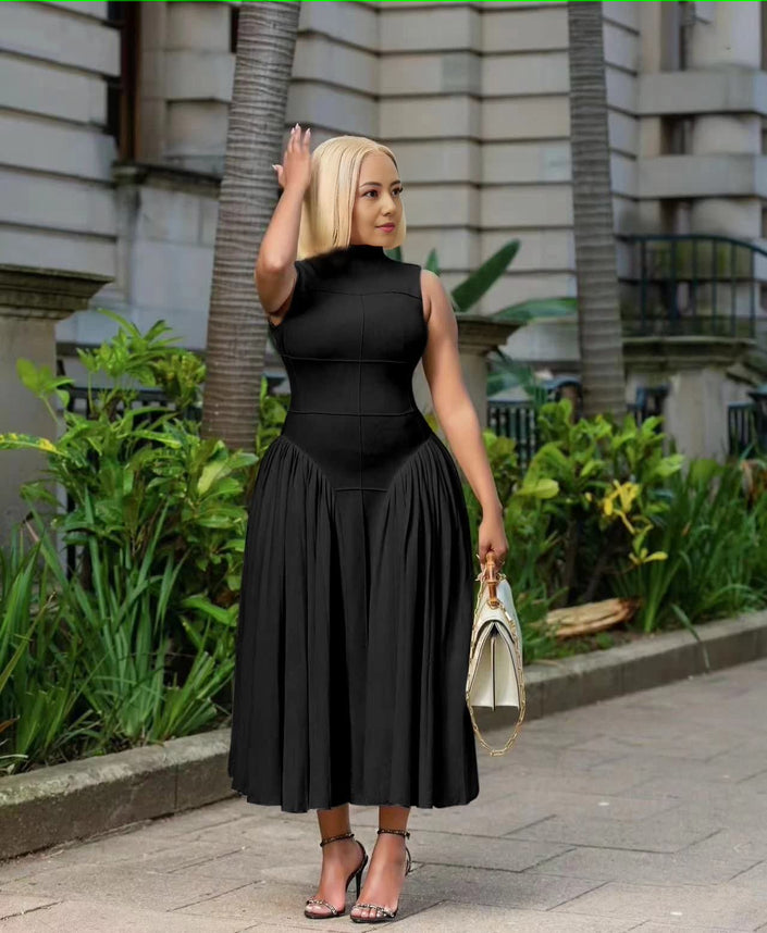 Black pleated midi A-line dress, sleeveless high neckline, fitted bodice and skirt