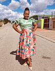 Green puff-sleeve blouse with floral skirt twin set