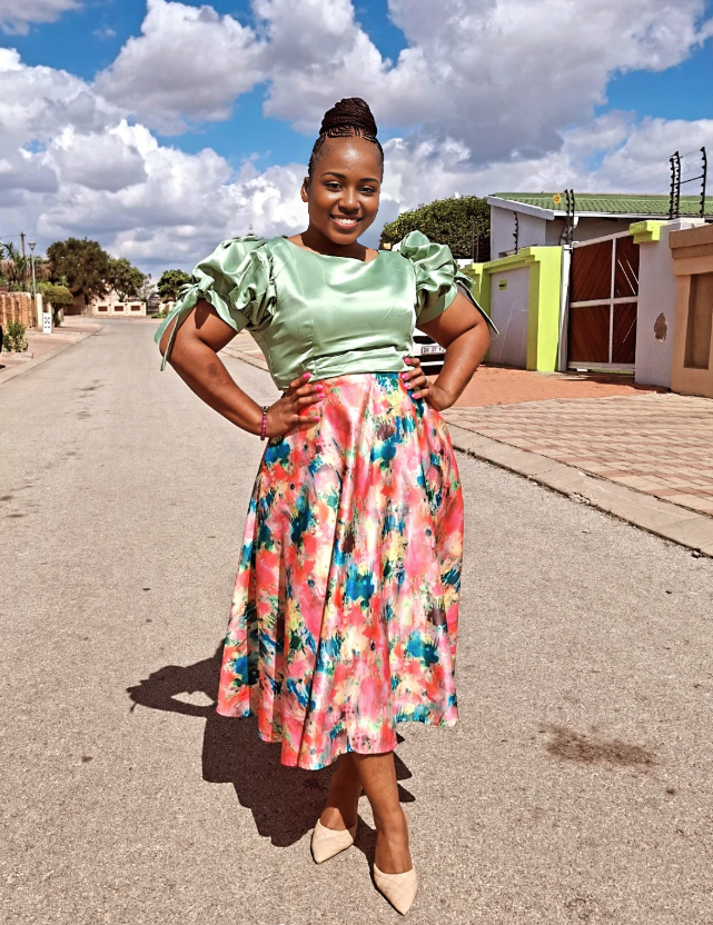 Green puff-sleeve blouse with floral skirt twin set