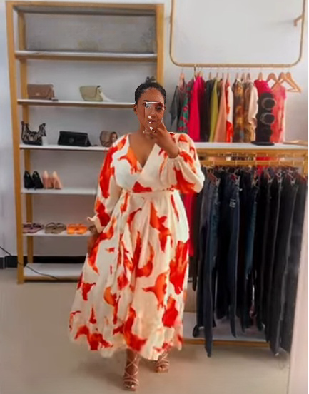 Abstract midi dress with red-and-white print, V-neck, tie waist, puff sleeves
