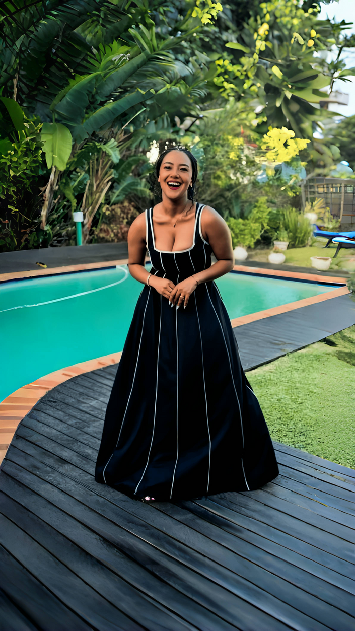 Navy striped square-neck sleeveless maxi dress, fitted bodice and full flared skirt