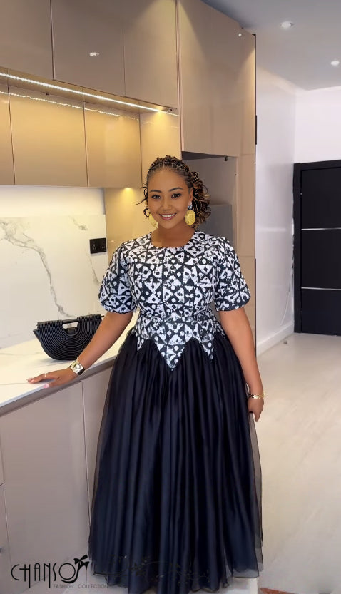 Printed bodice maxi dress with navy tulle skirt and gathered puffed skirt