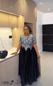 Printed bodice maxi dress with navy tulle skirt and short-sleeve patterned bodice