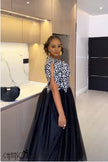 Printed bodice maxi dress with navy tulle skirt and front keyhole detail