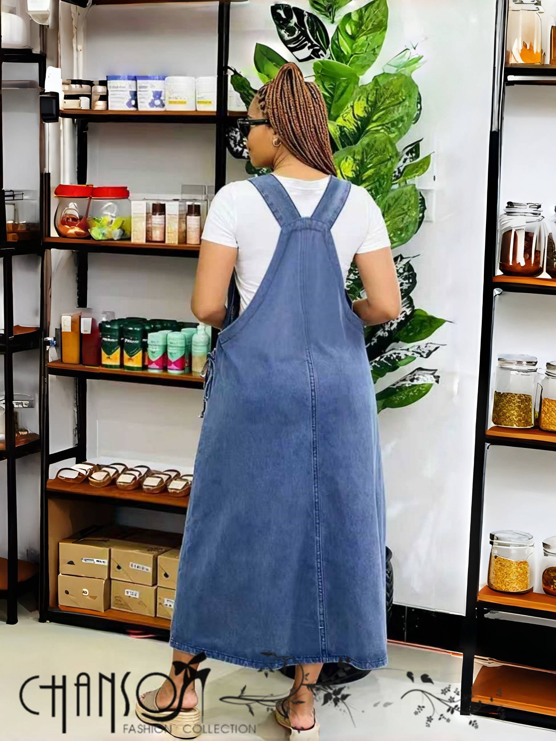 Dark blue denim maxi dress with crisscross back straps and center seam