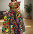 Geometric African print maxi dress with puff sleeves and gathered waist, multicolor.